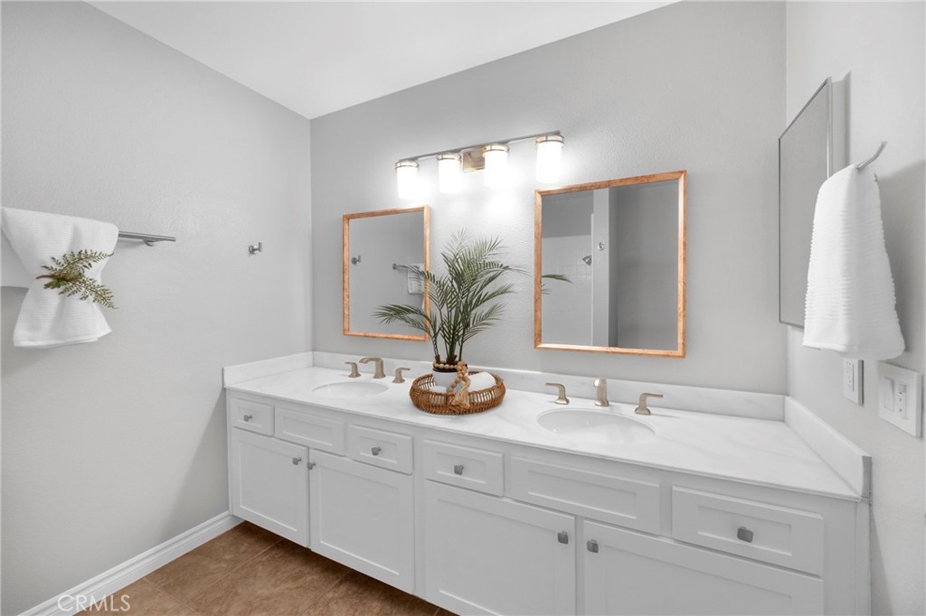 Second upstairs bedroom at 3675 Cypress Ln, bright and neutral with room for a desk or guest bed